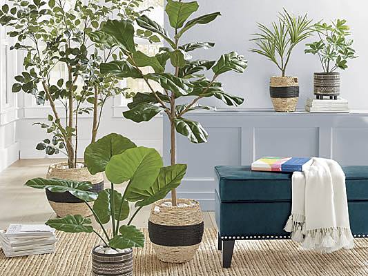 indoor artificial plant grouping with ottoman